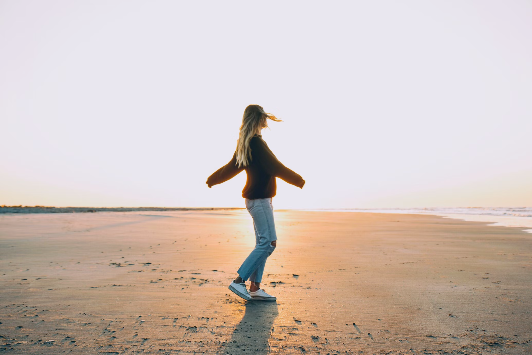 a person standing on a beach