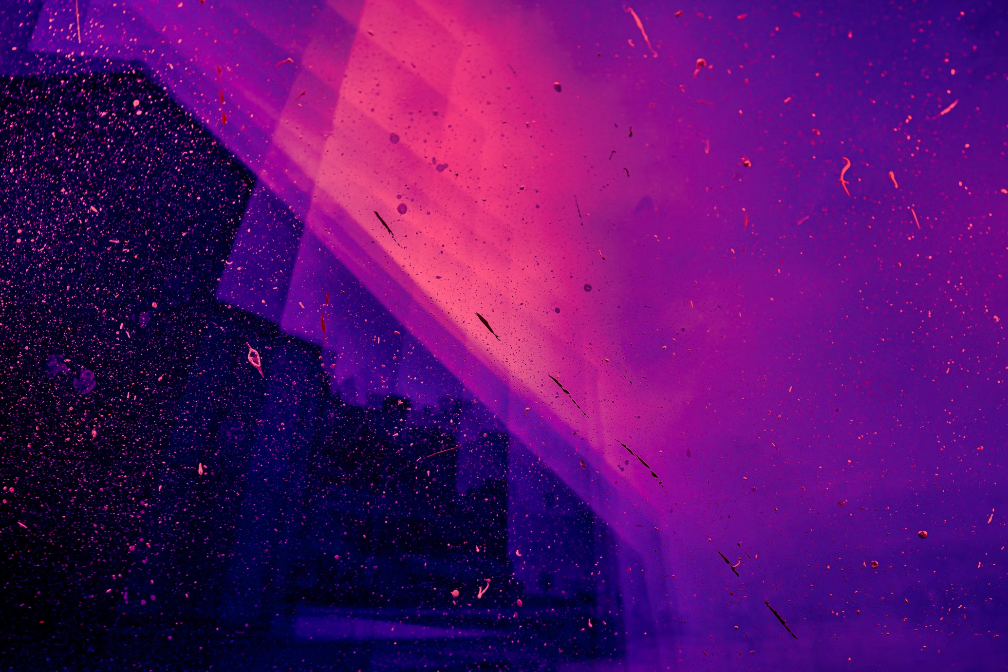 an abstract image with purple and orange hues